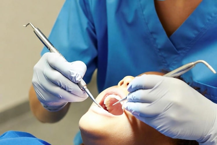 an oral surgery by a dentist