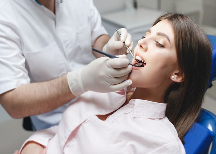 visiting dentist for dental emergency in Langley