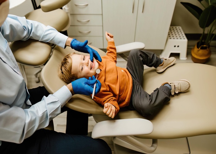 Toddlers visiting dentist