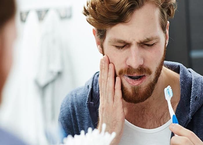 symptoms of tooth sensitivity after orthodontics